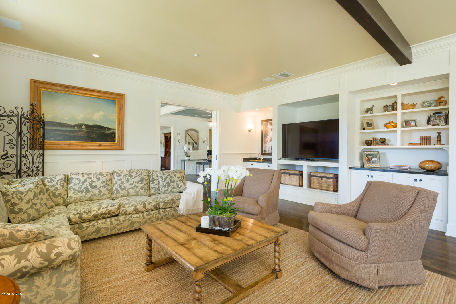 24900 Paseo Del Rancho Road Calabasas, CA 91302 - Photo 16 of 46 a living room with furniture and a flat screen tv