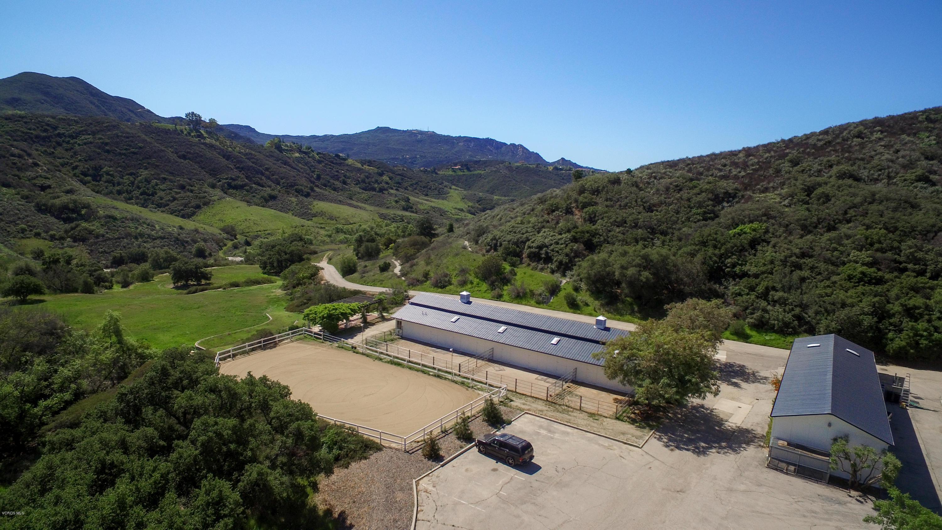 24900 Paseo Del Rancho Road Calabasas, CA 91302 - Photo 3 of 46 a view of a terrace with a garden