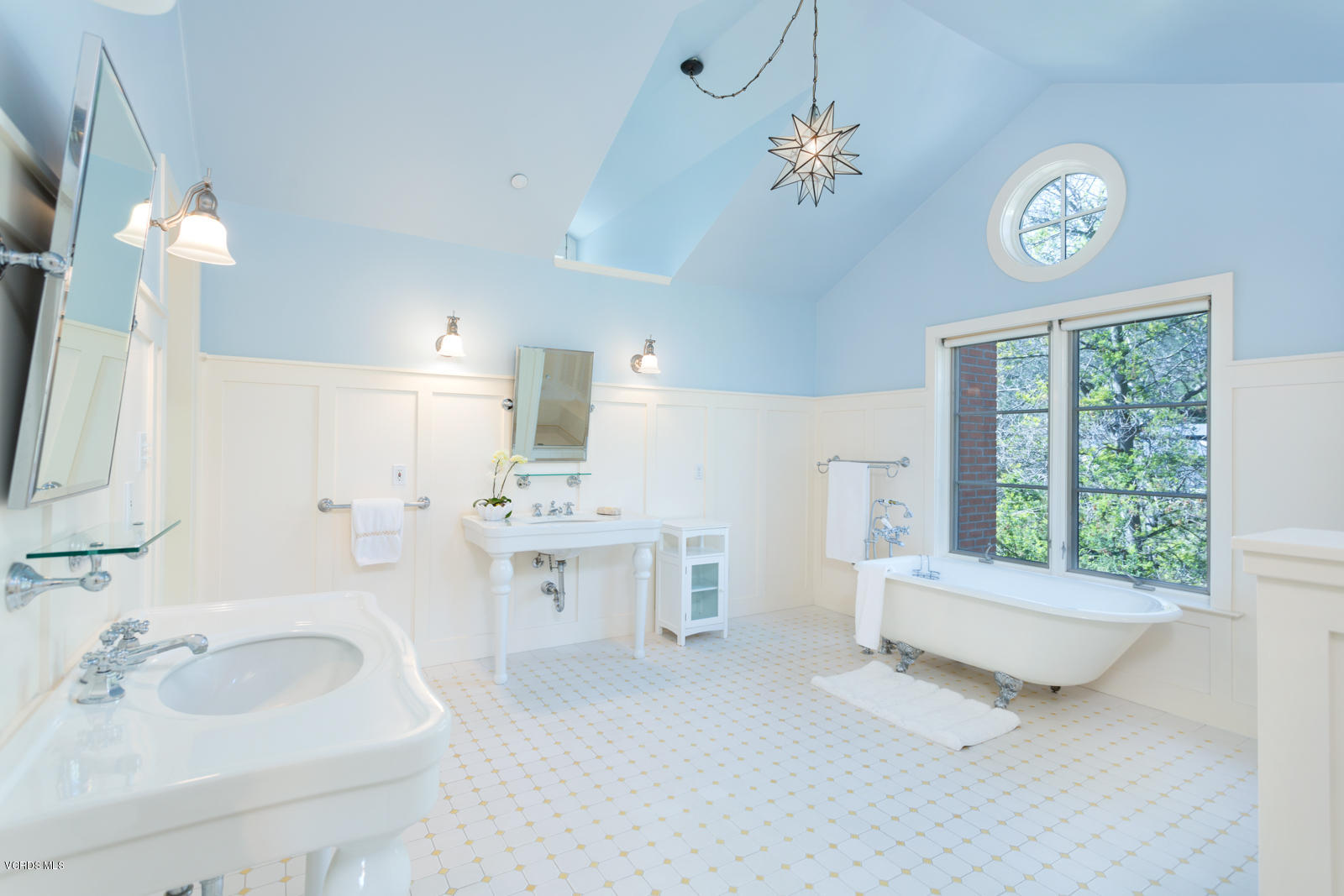24900 Paseo Del Rancho Road Calabasas, CA 91302 - Photo 29 of 46 a bathroom with a sink a large mirror and a bathtub