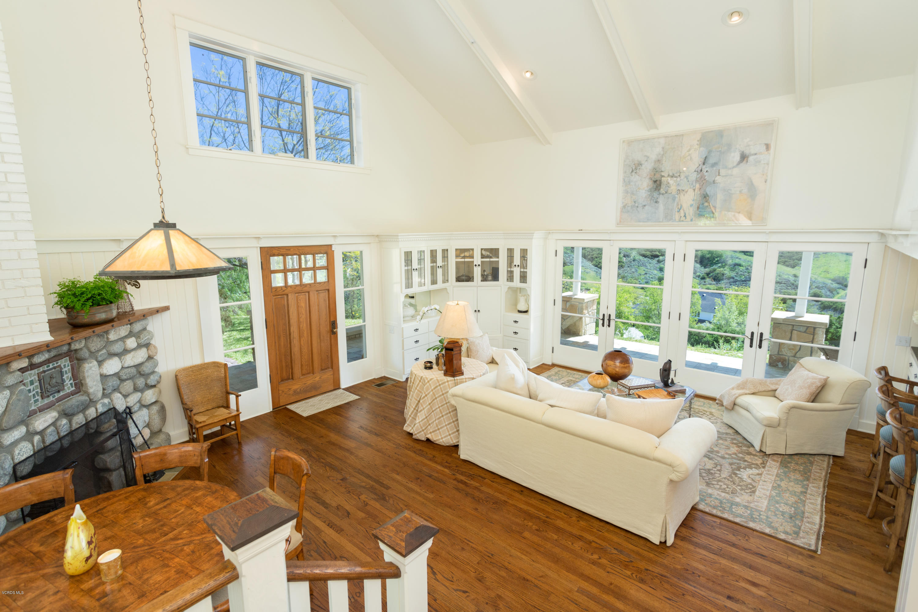 24900 Paseo Del Rancho Road Calabasas, CA 91302 - Photo 37 of 46 a living room with furniture fireplace and a large window