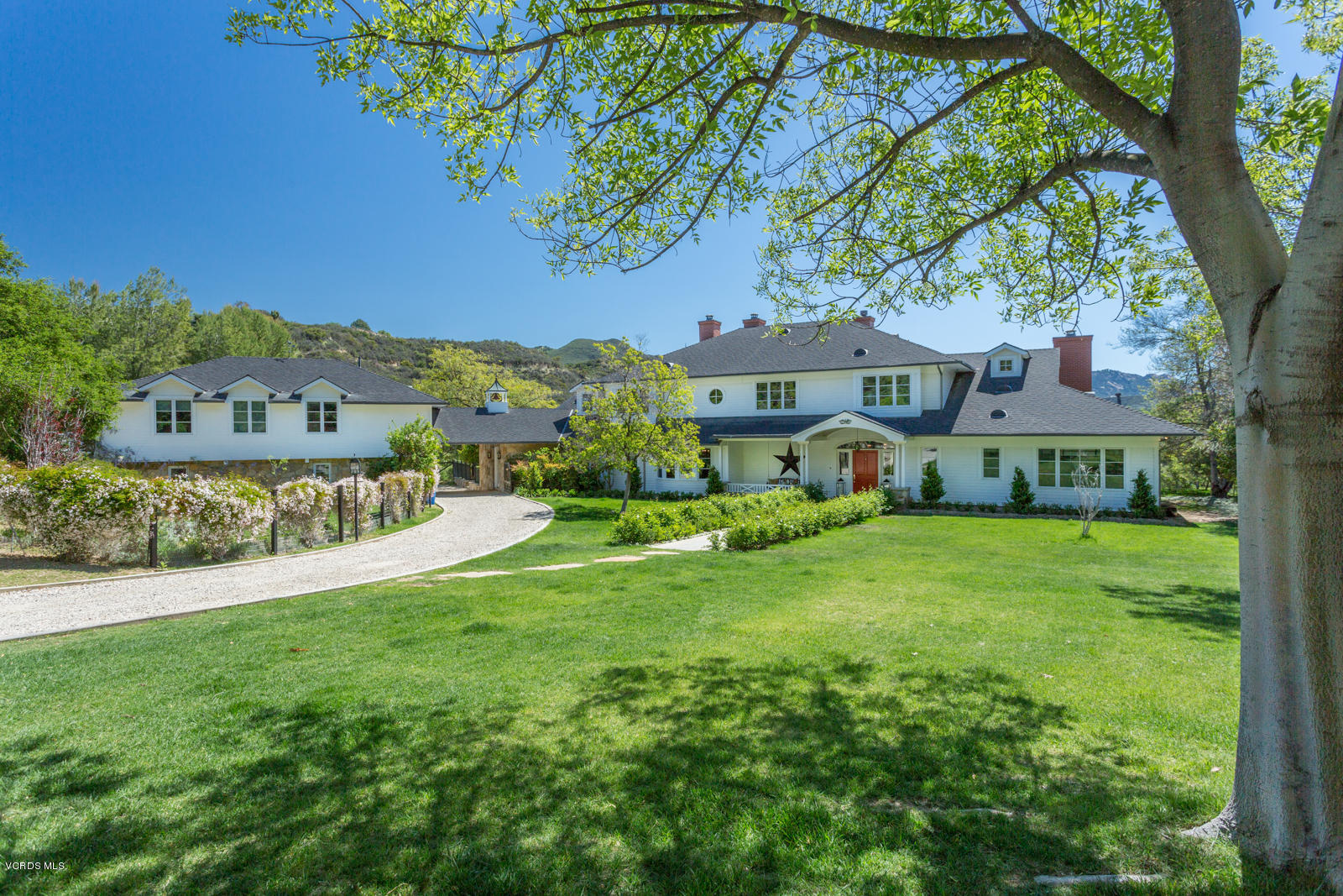 24900 Paseo Del Rancho Road Calabasas, CA 91302 - Photo 5 of 46 a view of house with garden