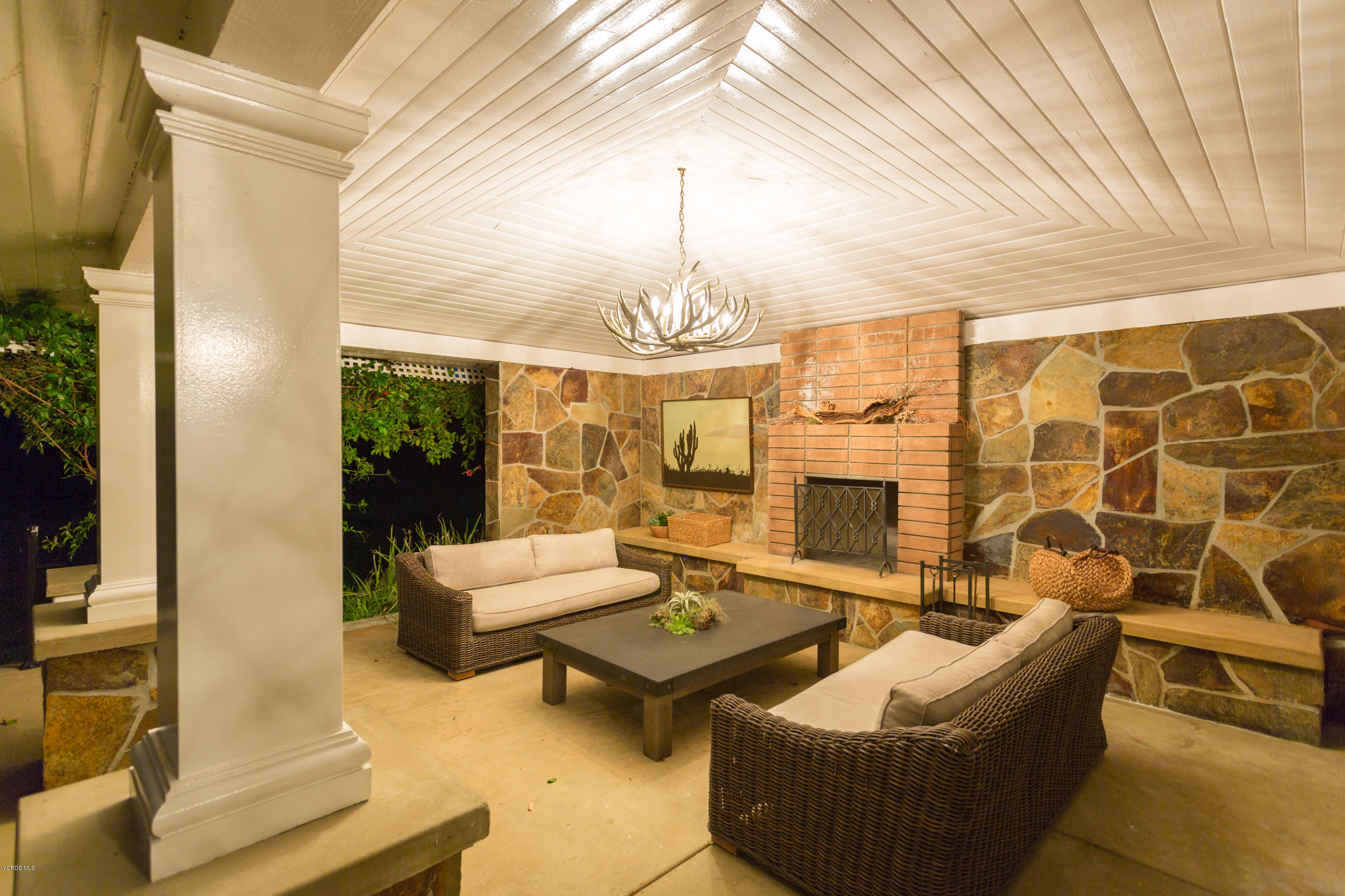 24900 Paseo Del Rancho Road Calabasas, CA 91302 - Photo 43 of 46 a living room with patio furniture and a chandelier