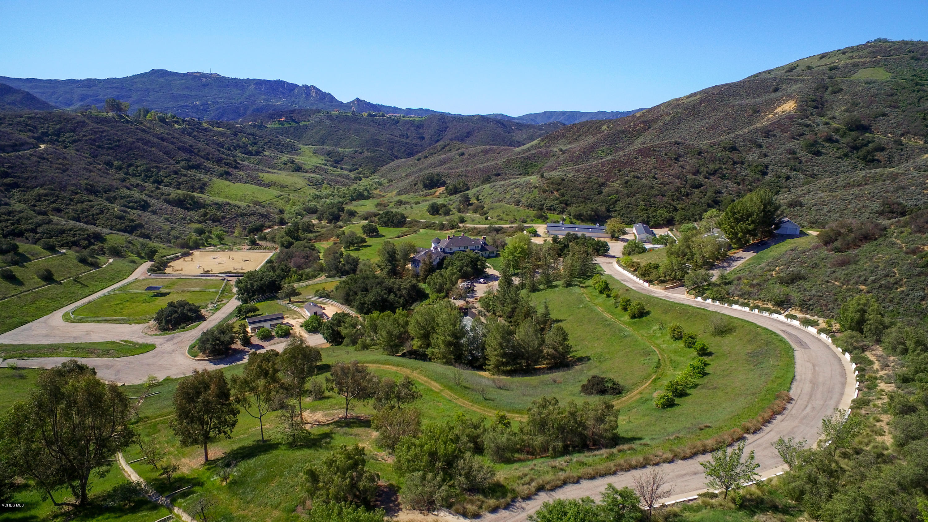 24900 Paseo Del Rancho Road Calabasas, CA 91302 - Photo 6 of 46 an aerial view of a house with mountain view