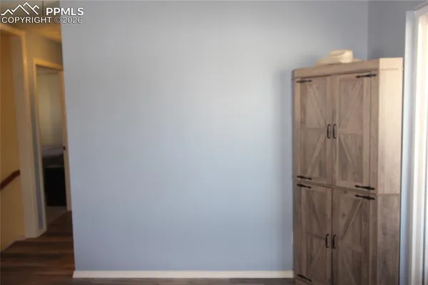 a view of a bathroom from a hallway