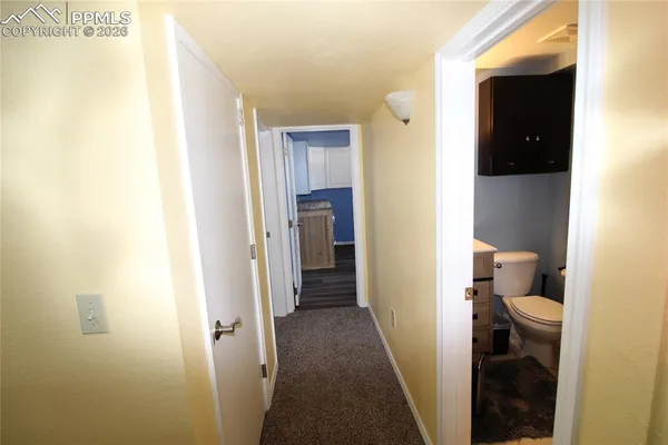 a view of hallway with stairs