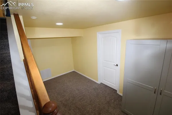 a room with storage and utility