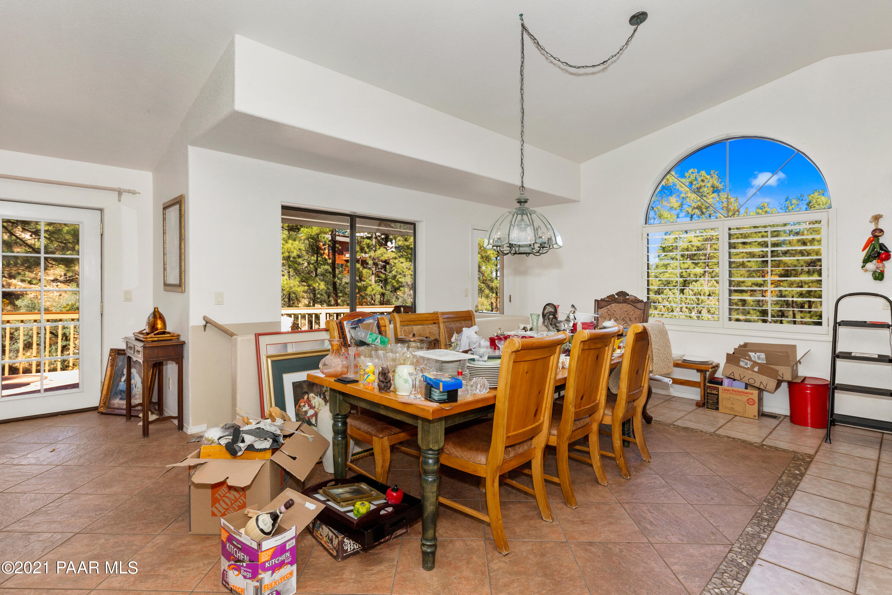 1424 East Valley View Road Prescott, AZ 86303 - Photo 12 of 43 a view of a dining room and livingroom with furniture window and wooden floor