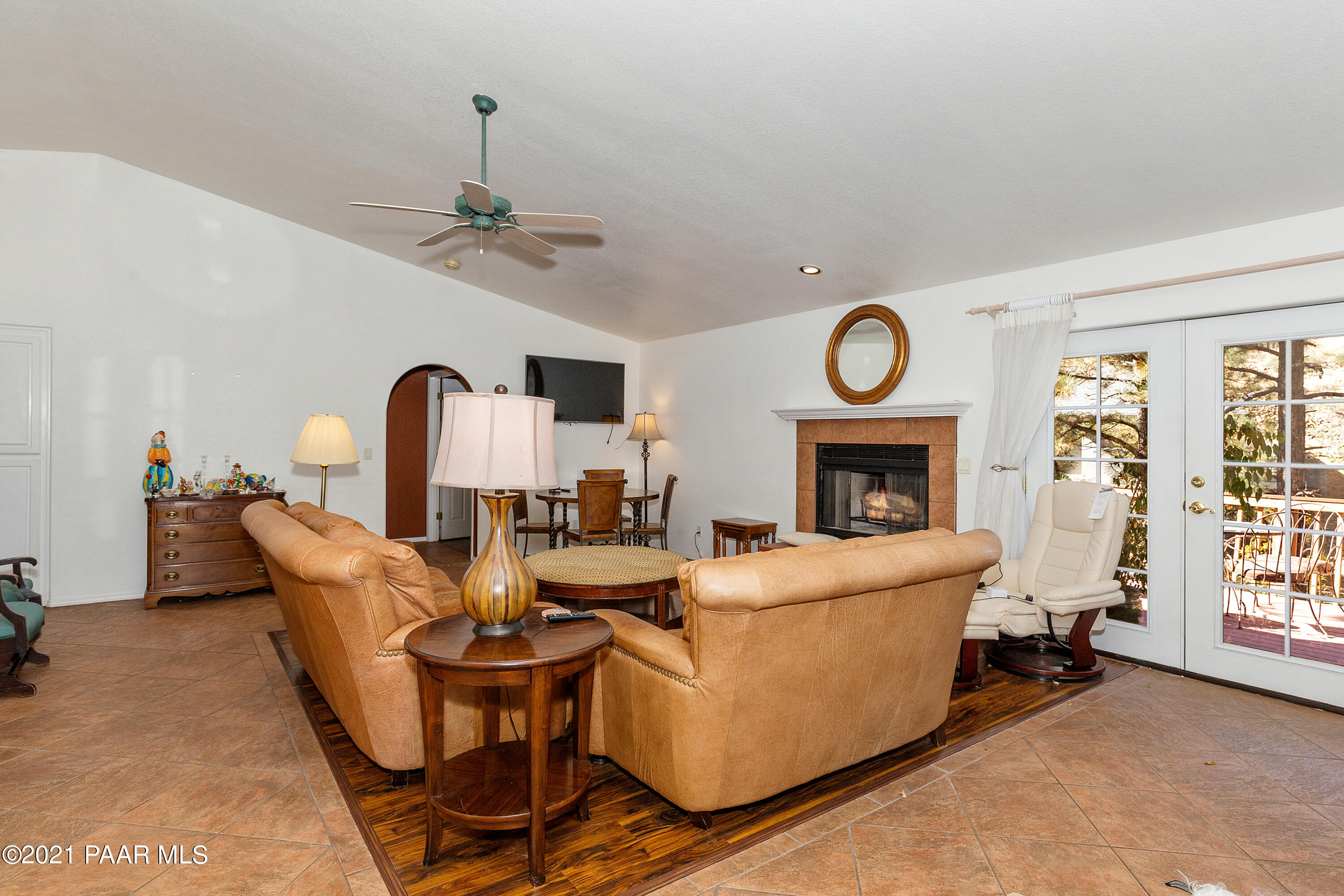 1424 East Valley View Road Prescott, AZ 86303 - Photo 9 of 43 a living room with fireplace furniture and a window
