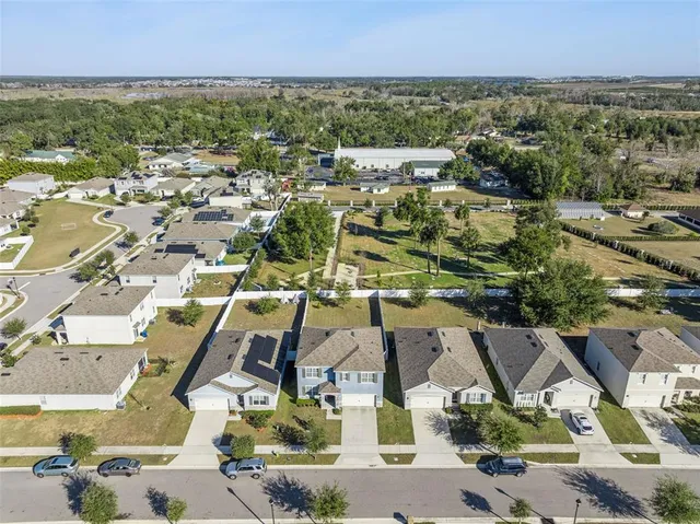 an aerial view of multiple house