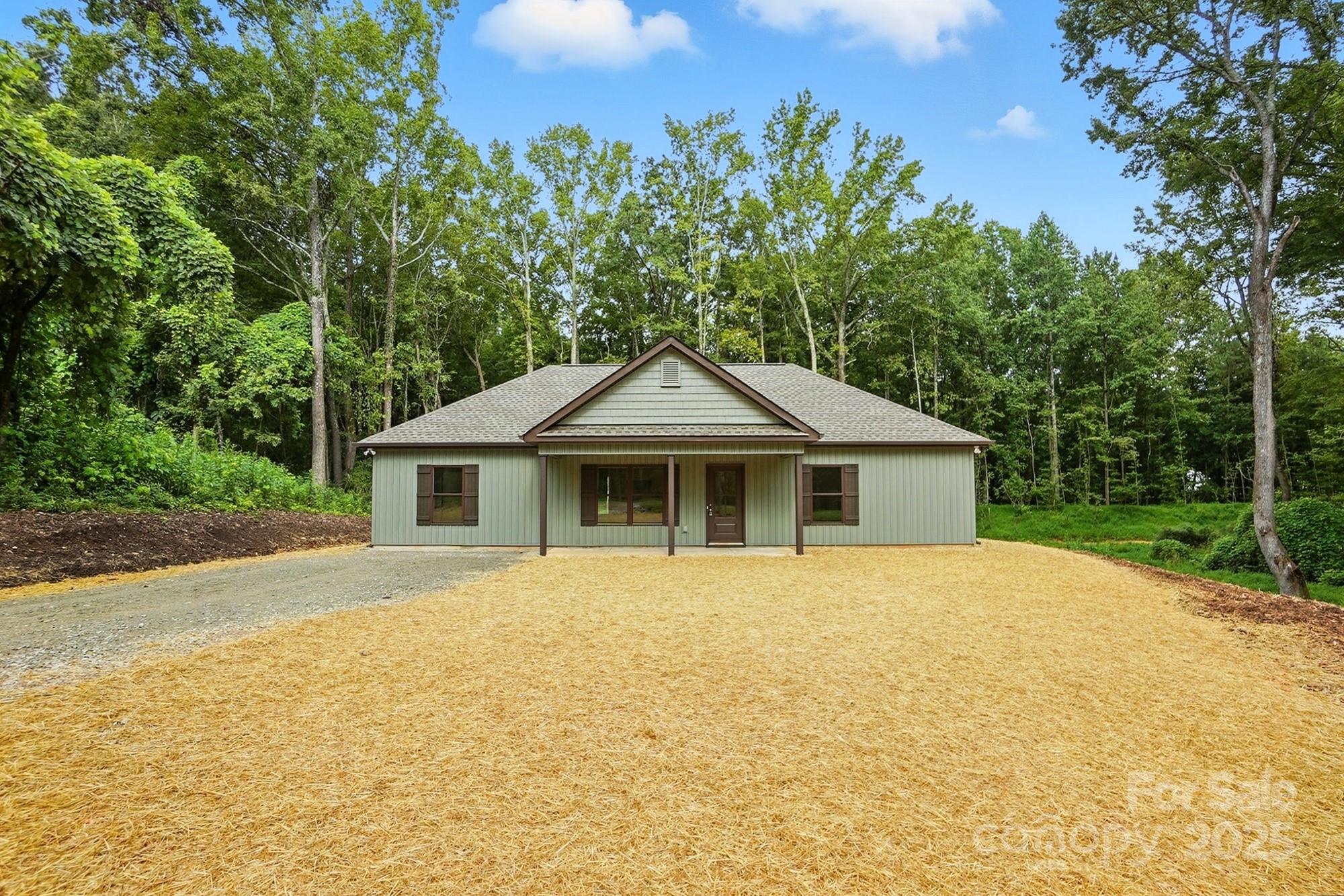 233 Lincoln Road York, SC 29745 - Photo 2 of 37 a front view of a house with yard and green space