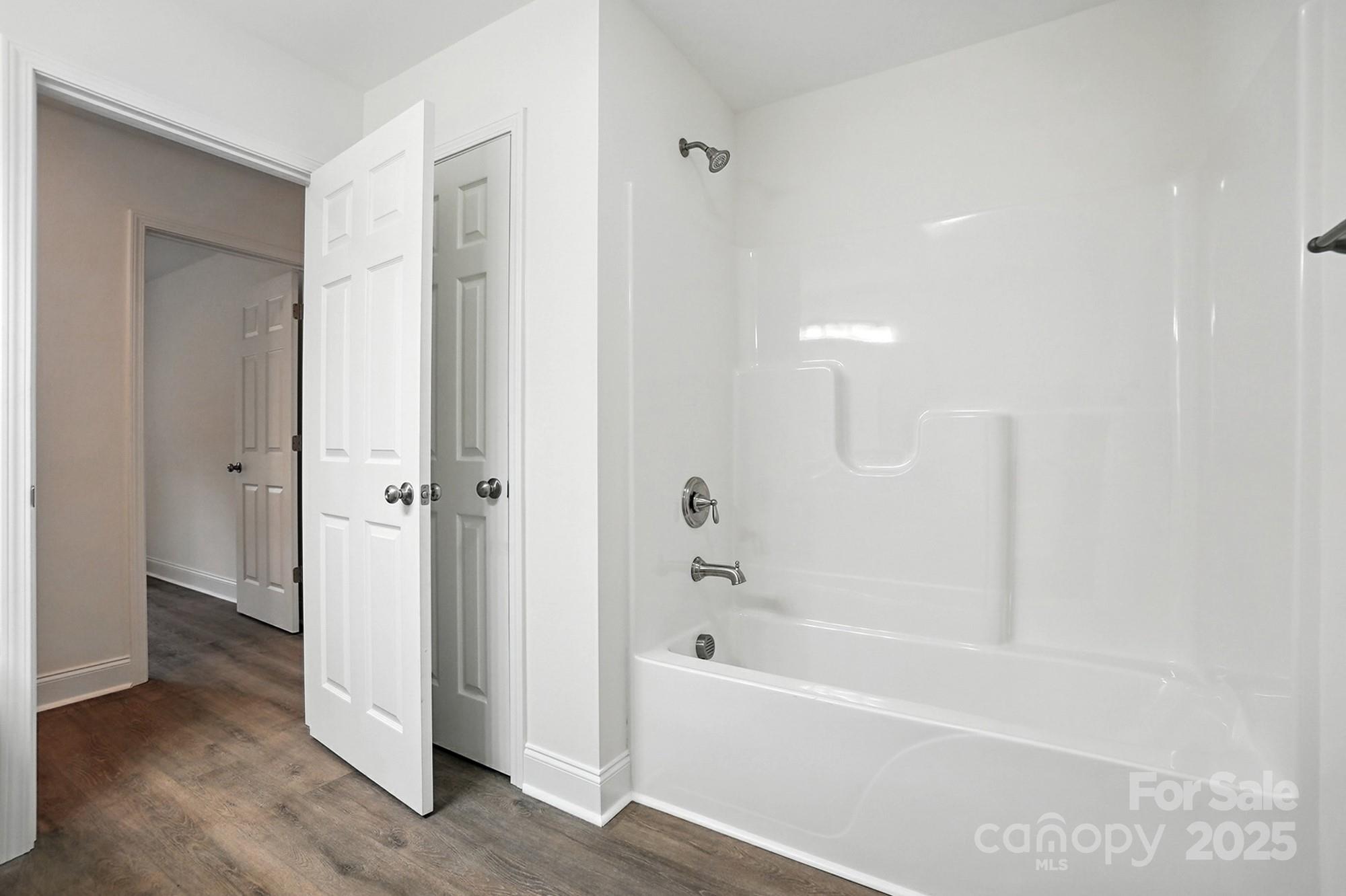 233 Lincoln Road York, SC 29745 - Photo 27 of 37 a bathroom with a bathtub and shower
