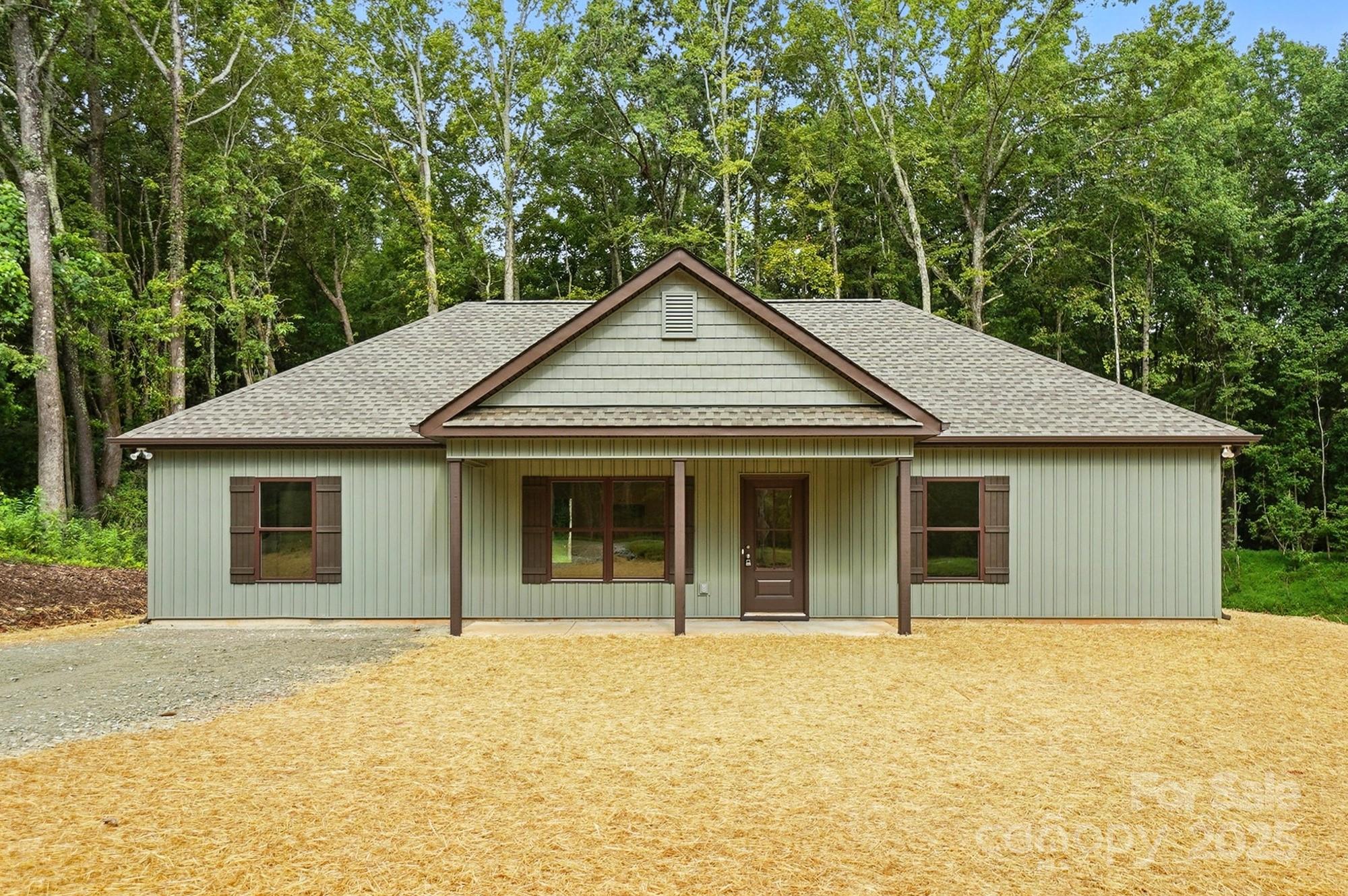 233 Lincoln Road York, SC 29745 - Photo 3 of 37 a house with trees in the background