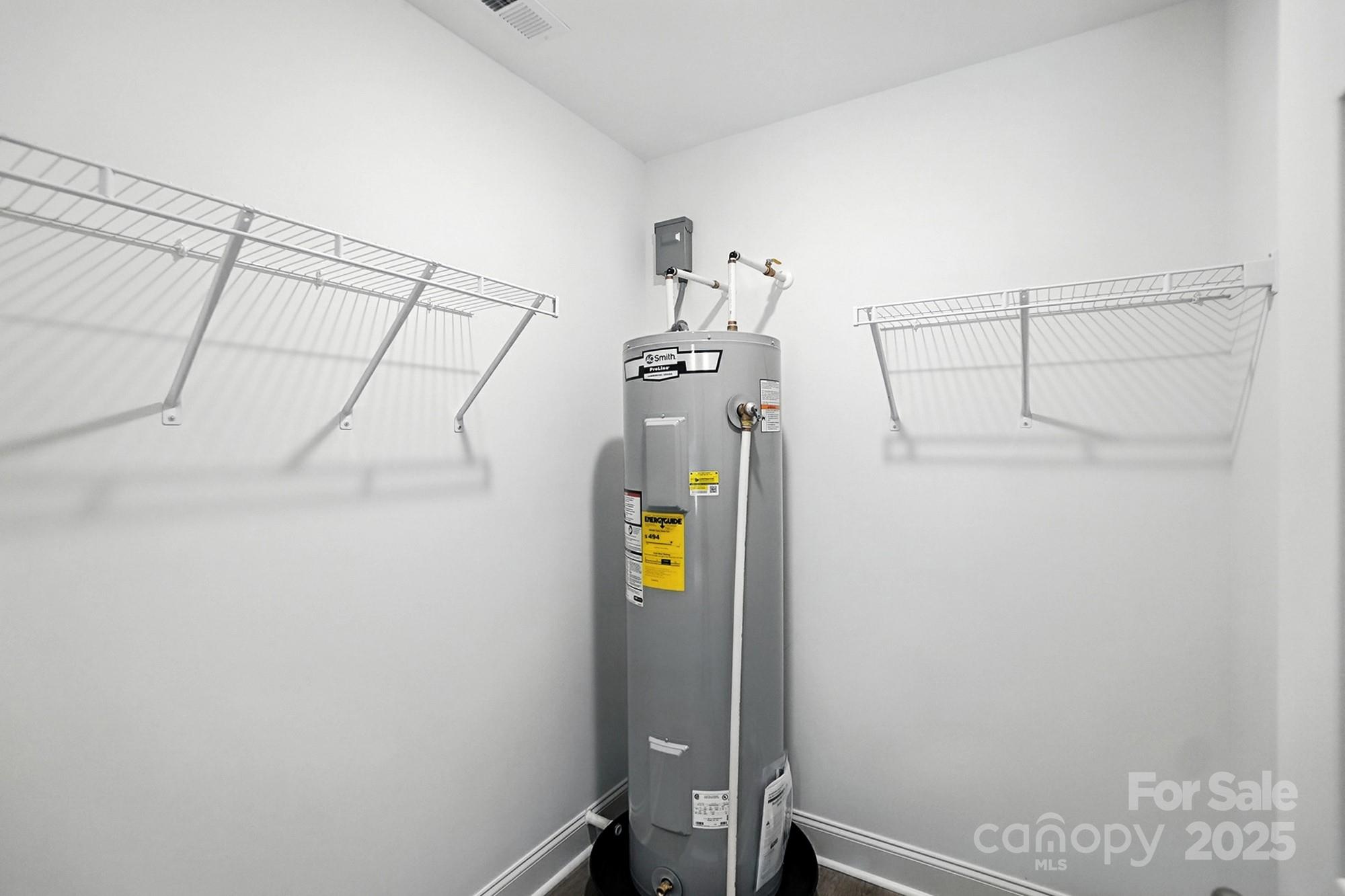 233 Lincoln Road York, SC 29745 - Photo 31 of 37 a view of storage and utility room with racks on the wall