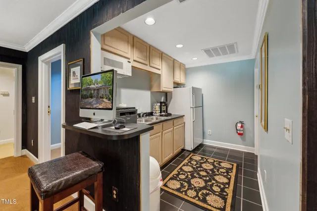 a bathroom with a double vanity sink toilet and shower