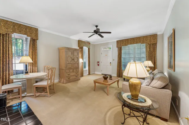 a room with furniture and a chandelier