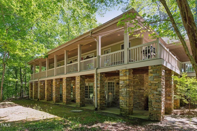 a kitchen with a sink cabinets and a window