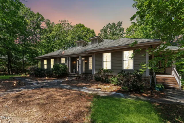 a balcony with furniture and wooden deck