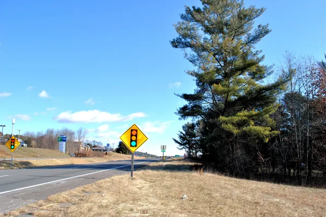a view of a building and trees