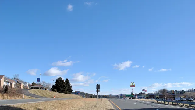 a view of a city street from a building