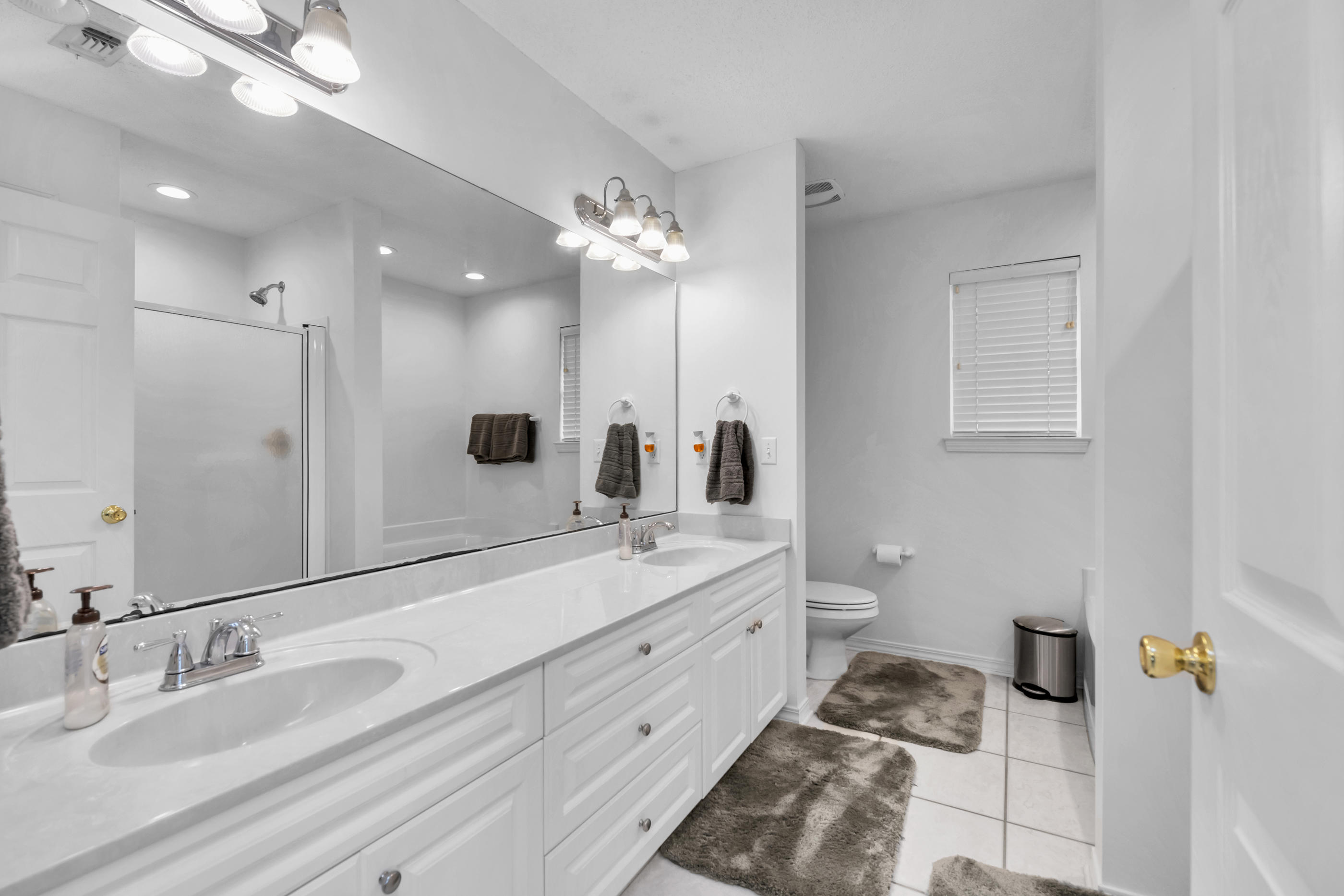 738 Riva Ridge Drive Crestview, FL 32539 - Photo 16 of 23 a spacious bathroom with a double vanity sink double and mirror