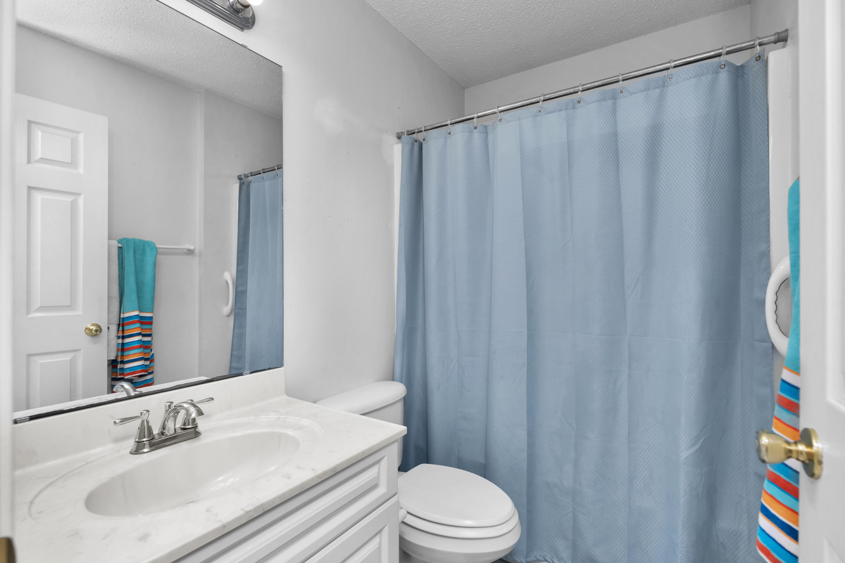 738 Riva Ridge Drive Crestview, FL 32539 - Photo 18 of 23 a bathroom with a sink toilet and shower