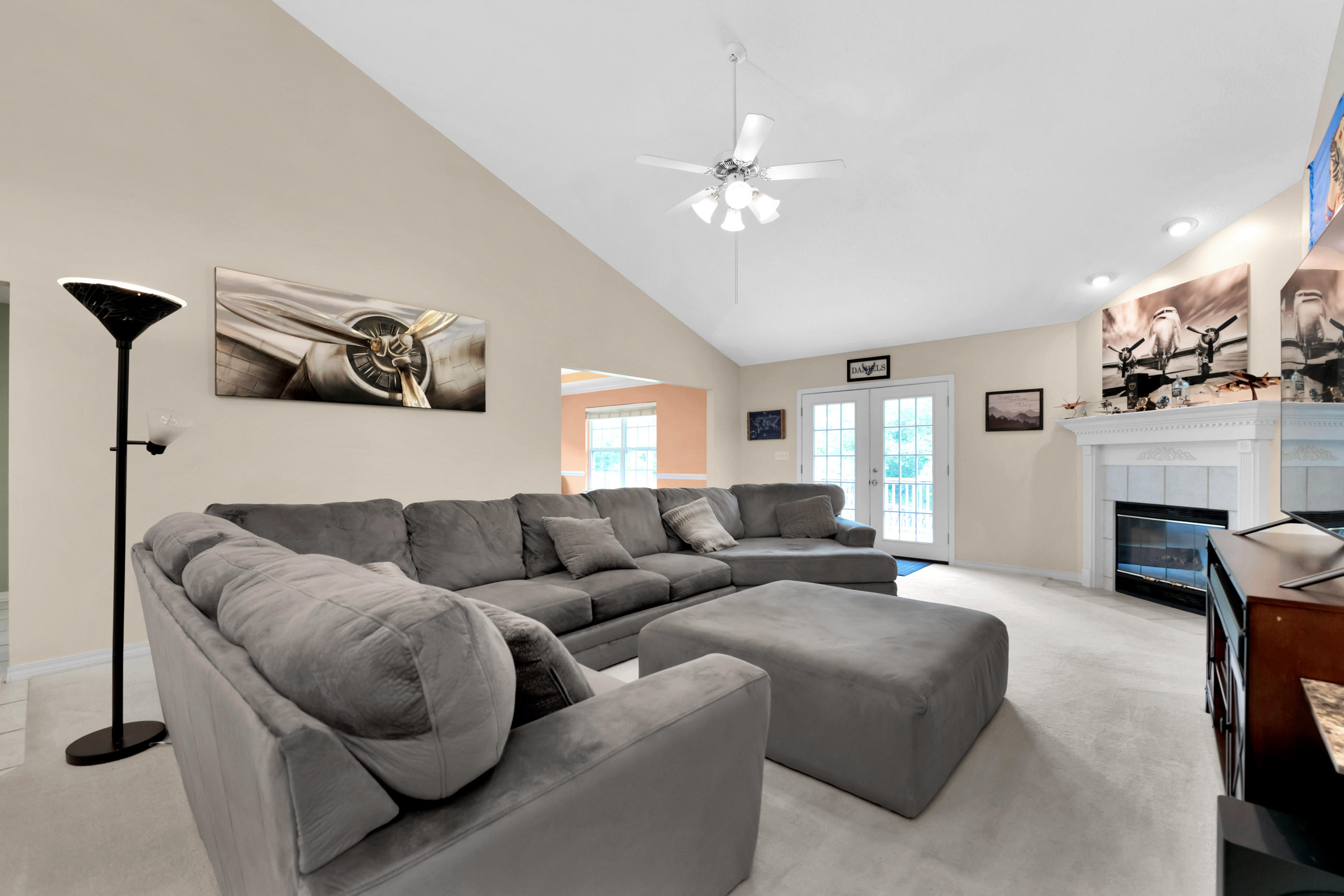 738 Riva Ridge Drive Crestview, FL 32539 - Photo 5 of 23 a living room with furniture and a fireplace