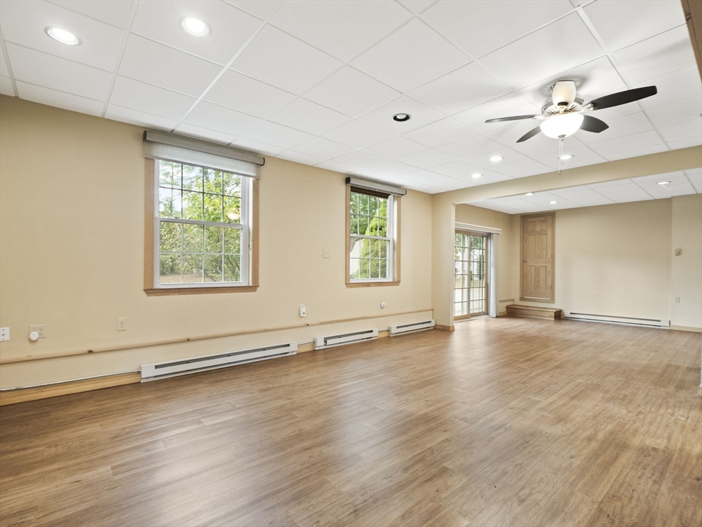 15 South Holden Road Warwick, MA 01378 - Photo 14 of 42 a view of an empty room with wooden floor and a window