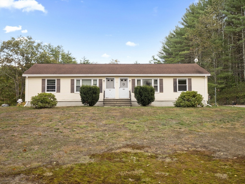 15 South Holden Road Warwick, MA 01378 - Photo 2 of 42 a front view of a house with garden