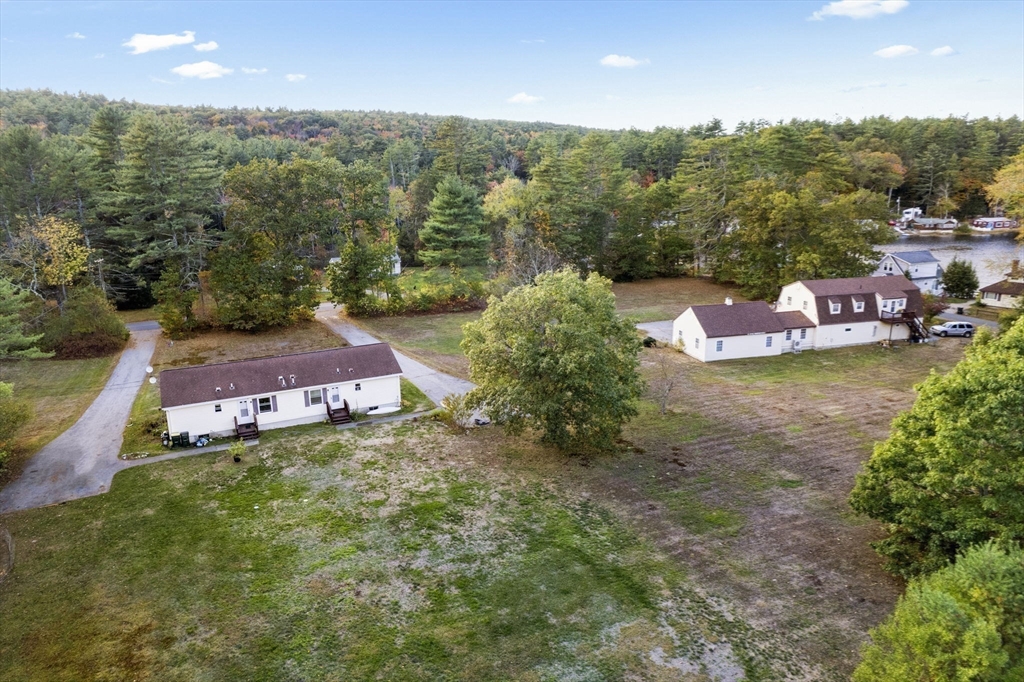 15 South Holden Road Warwick, MA 01378 - Photo 31 of 42 an aerial view of a house with a yard and lake view