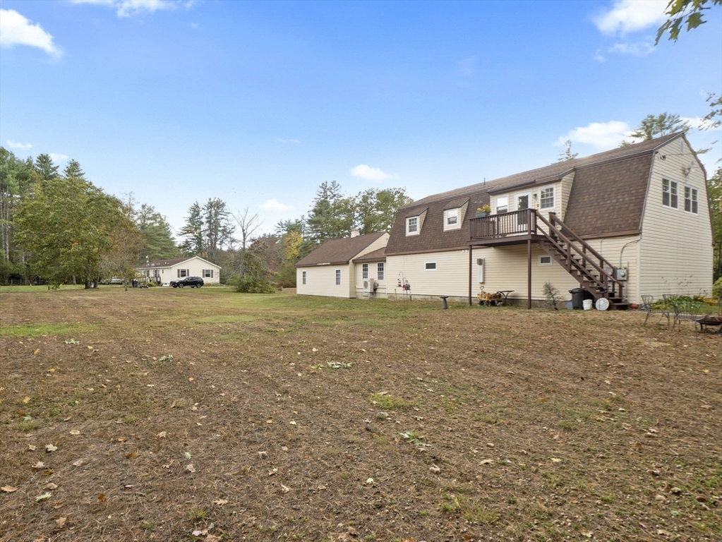 15 South Holden Road Warwick, MA 01378 - Photo 7 of 42 a front view of a house with a yard
