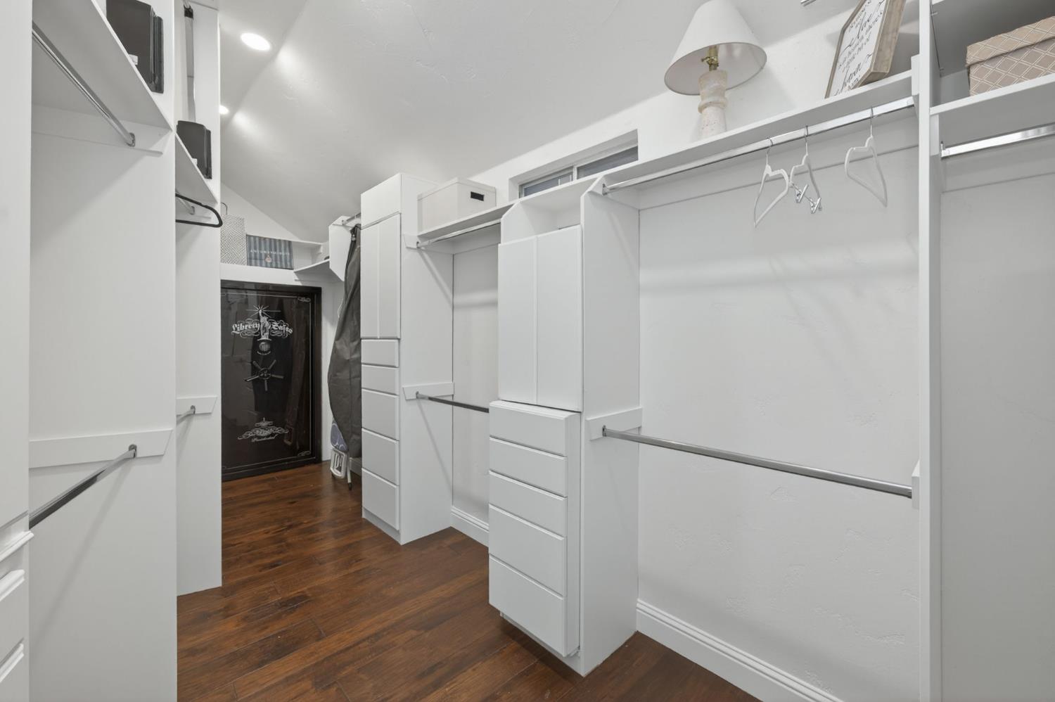 601 Decatur Avenue Clovis, CA 93611 - Photo 29 of 62 a view of walk in closet with wooden floor