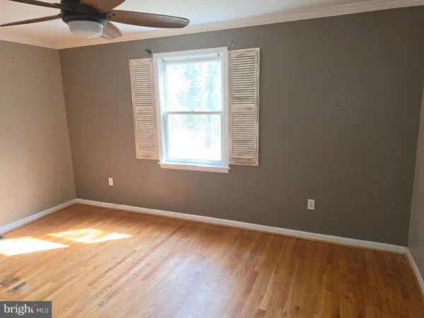 a bath tub sitting next to a window