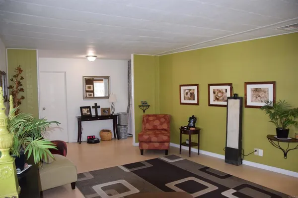 a room with furniture and a window