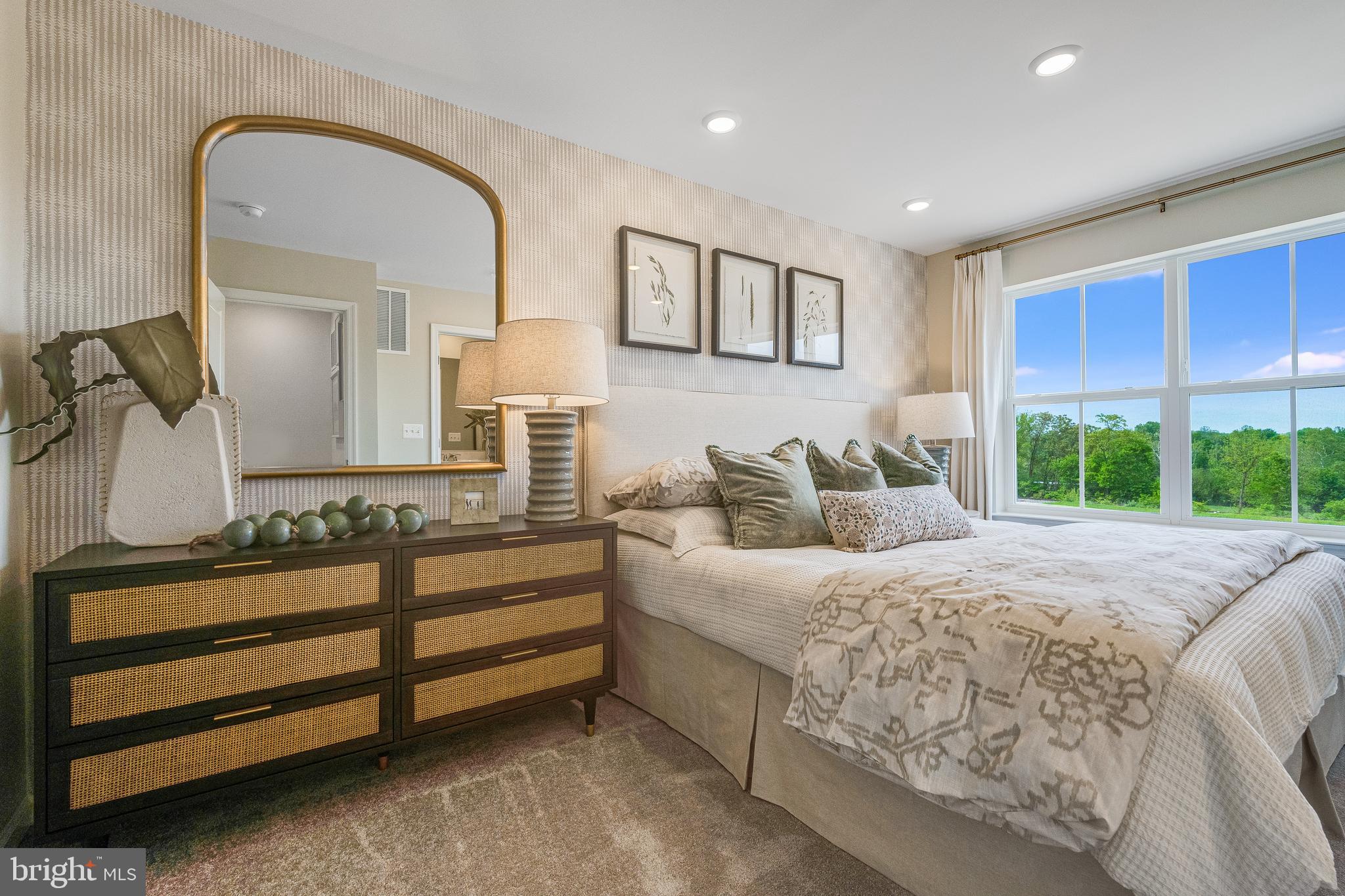 456 18th Avenue Ranson, WV 25438 - Photo 16 of 37 a bedroom with a large bed and windows