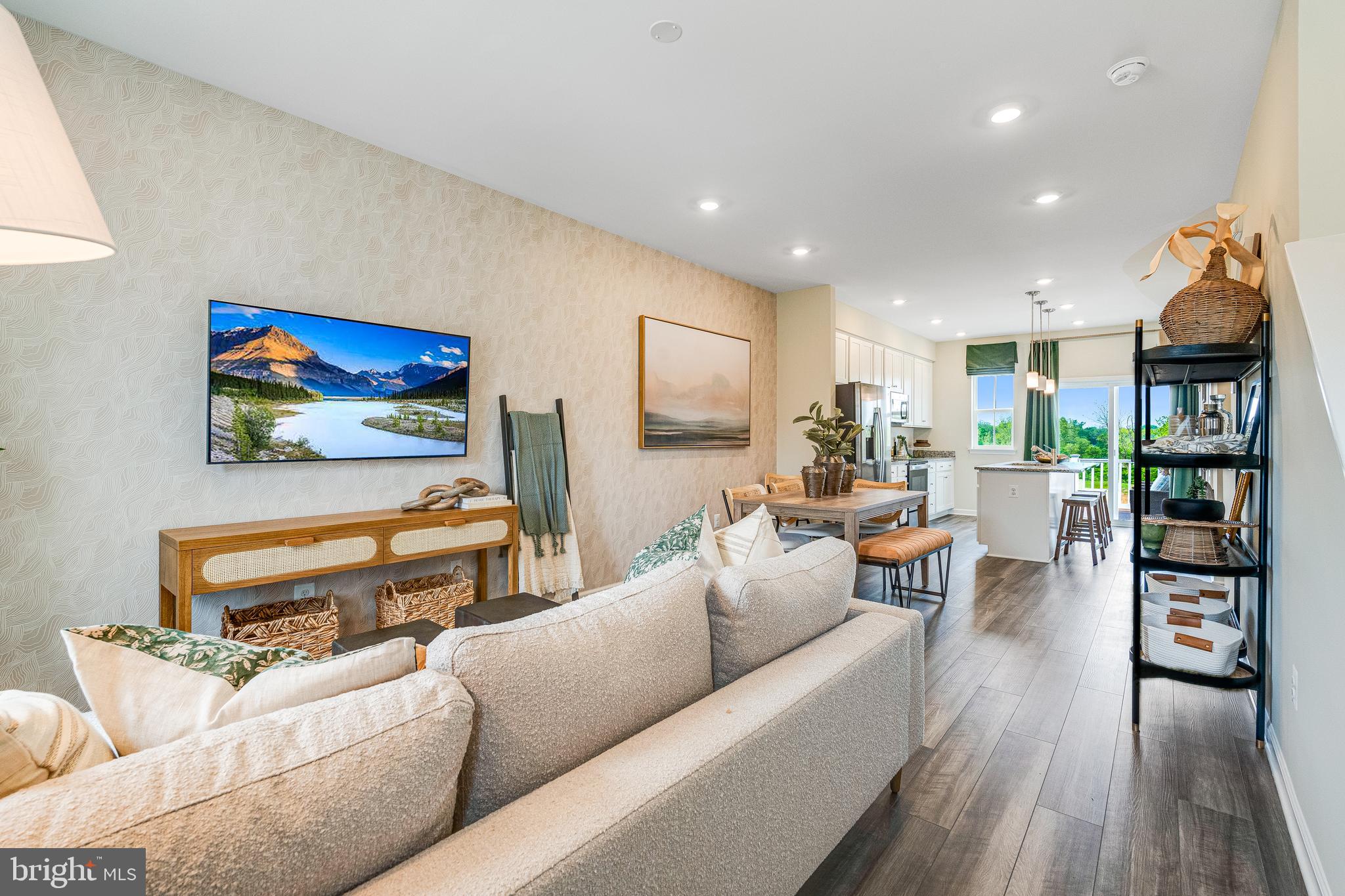 456 18th Avenue Ranson, WV 25438 - Photo 5 of 37 a living room with furniture kitchen view and a wooden floor