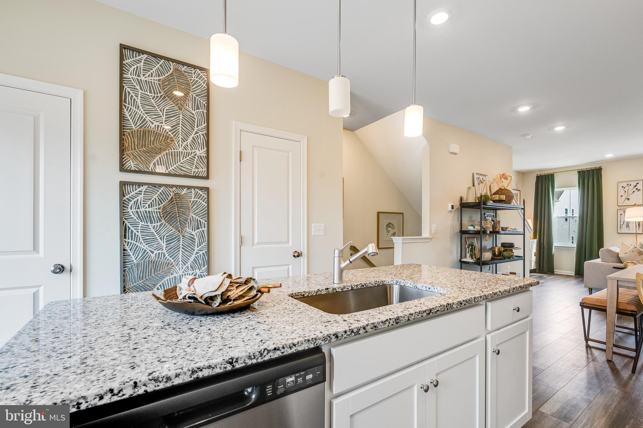 456 18th Avenue Ranson, WV 25438 - Photo 6 of 37 a kitchen with sink and refrigerator