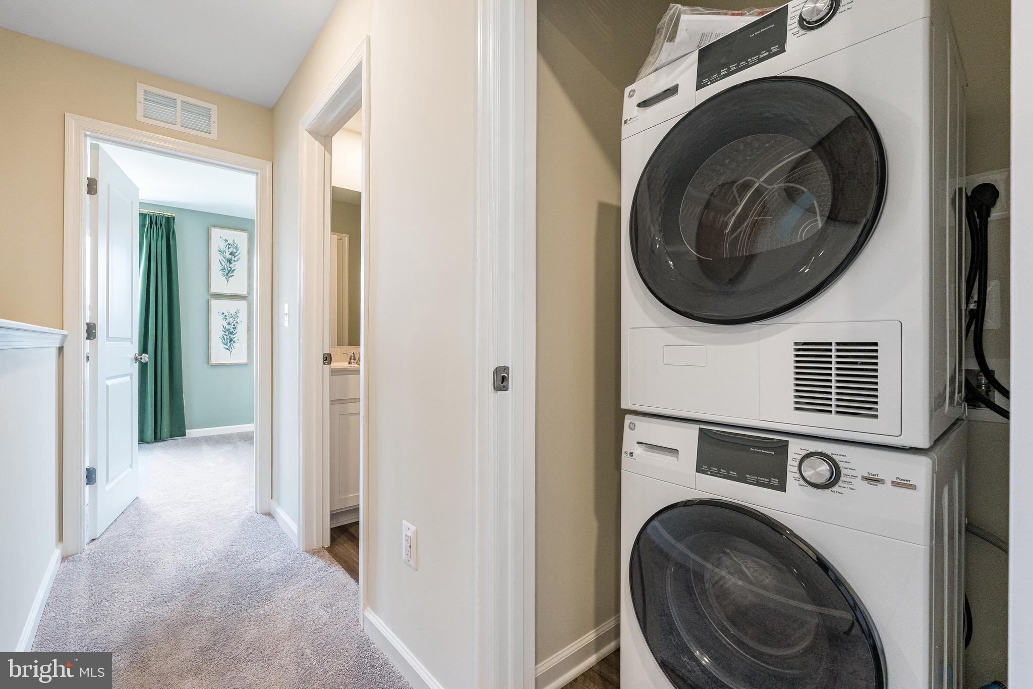 456 18th Avenue Ranson, WV 25438 - Photo 7 of 37 a view of a hallway with washer and dryer