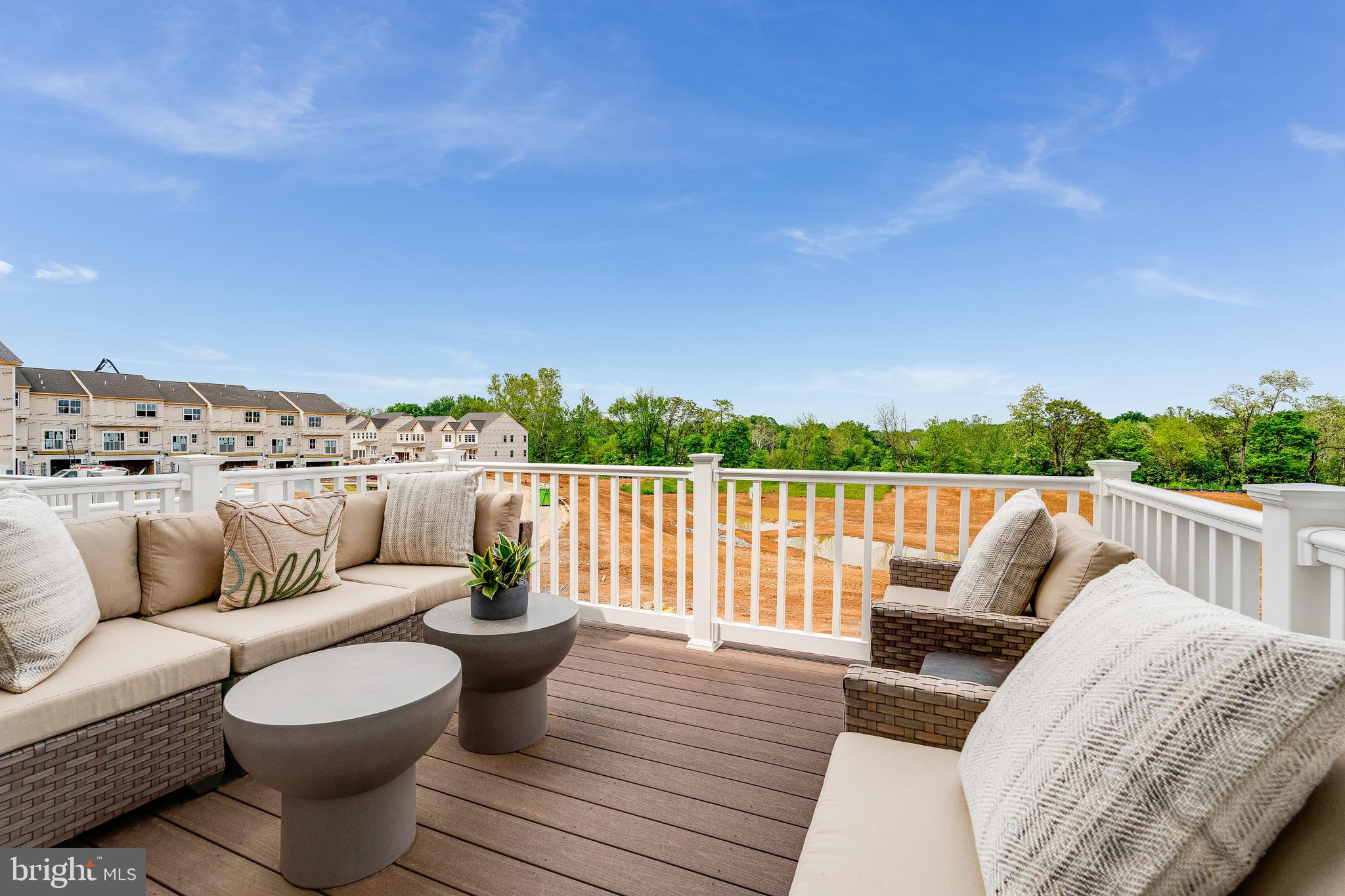 456 18th Avenue Ranson, WV 25438 - Photo 8 of 37 a patio with couches and a potted plant