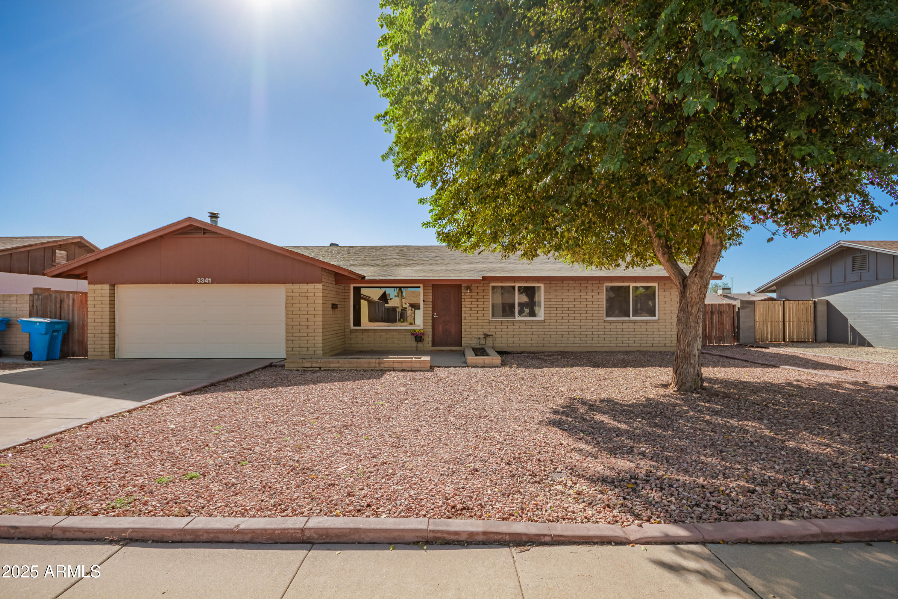 3341 West Pershing Avenue Phoenix, AZ 85029 - Photo 1 of 36 a front view of a house with a yard