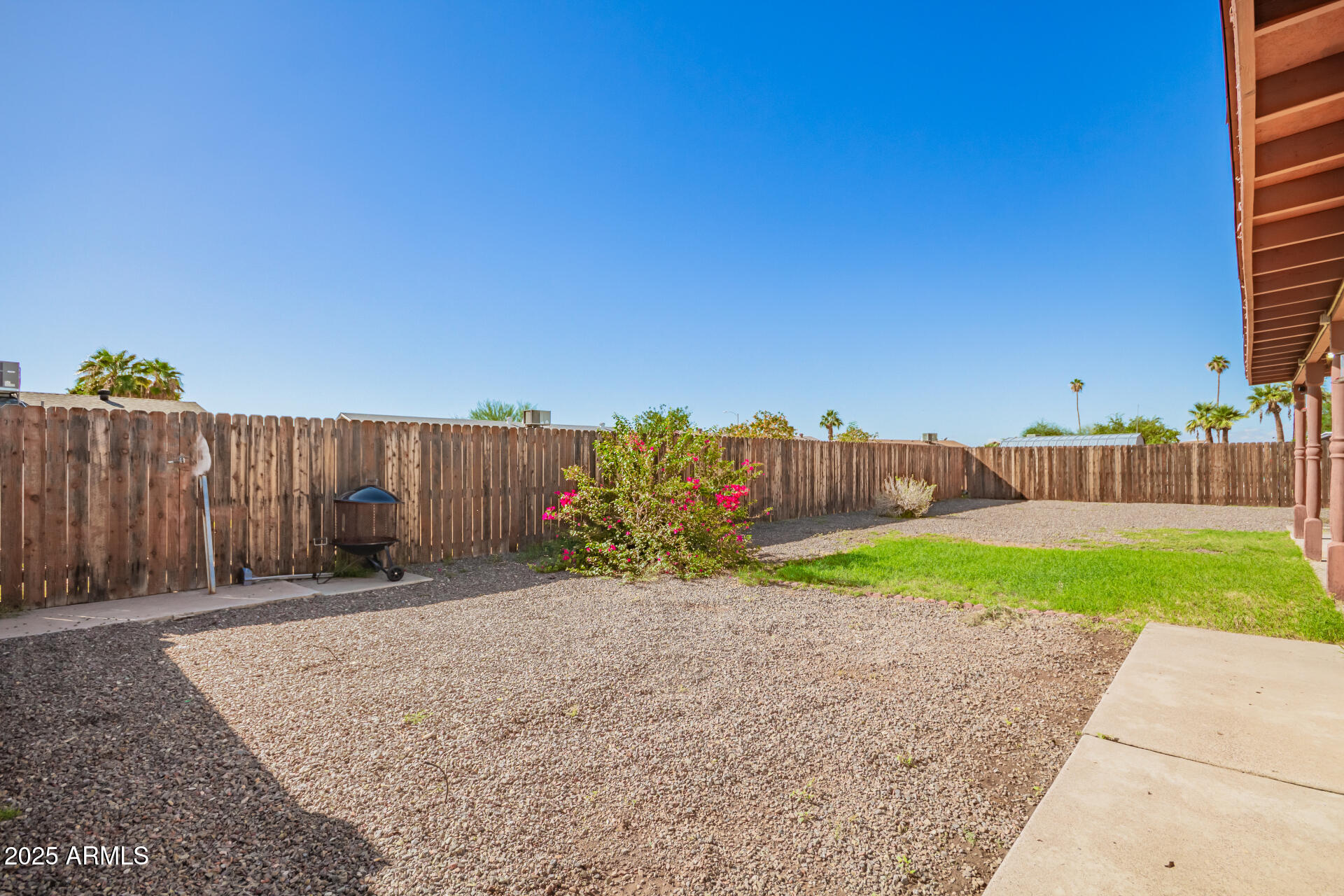 3341 West Pershing Avenue Phoenix, AZ 85029 - Photo 33 of 36 a backyard of a house with lots of green space