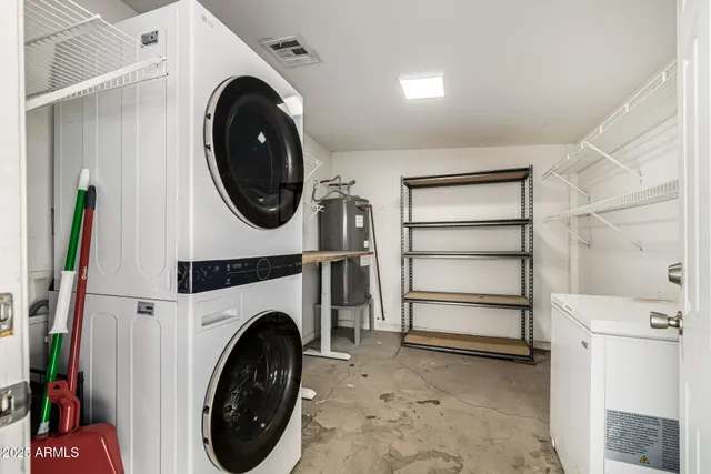 a utility room with dryer and washer
