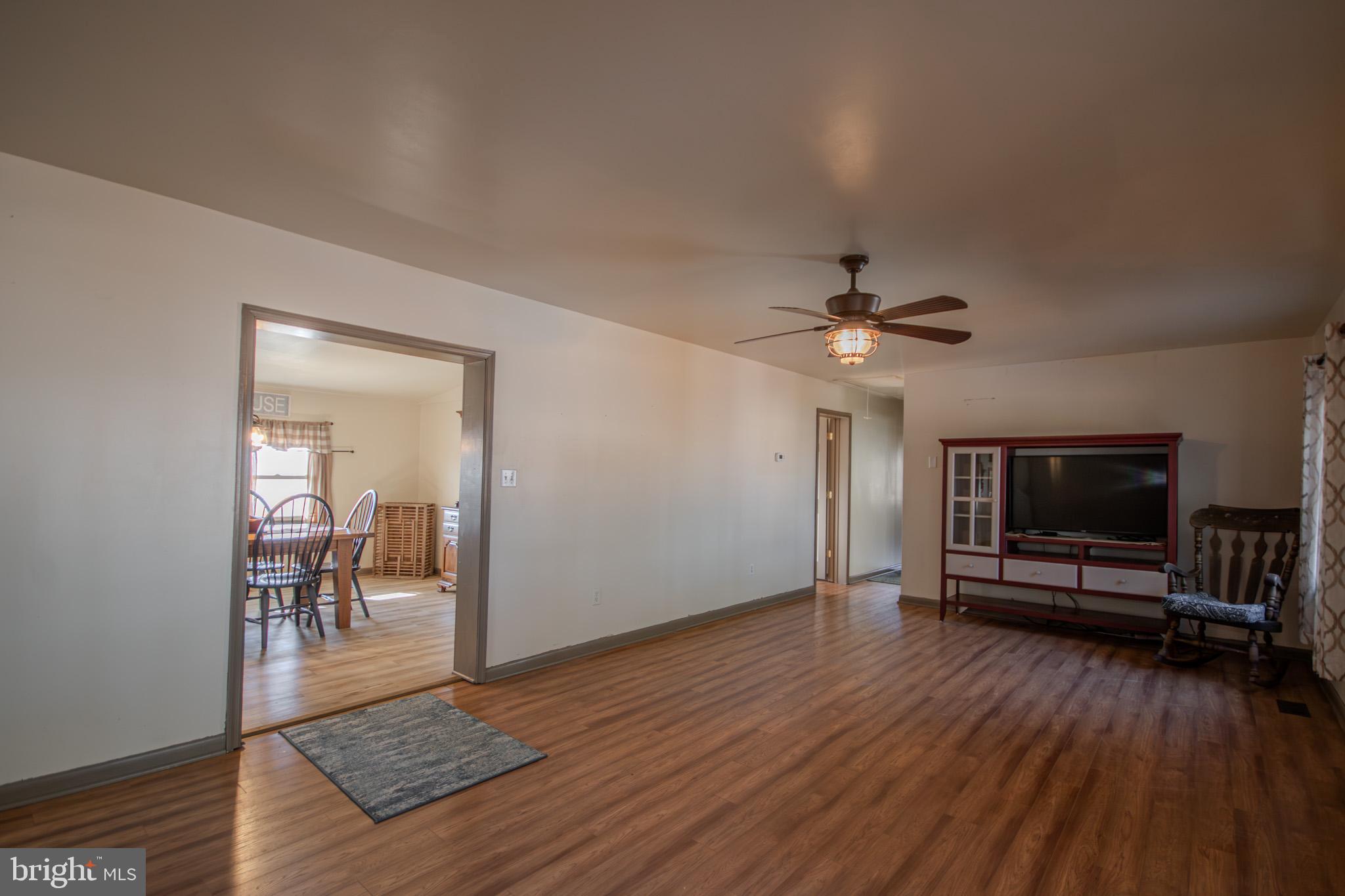 6761 Sharptown Road Laurel, DE 19956 - Photo 13 of 34 a view of livingroom with furniture and wooden floor