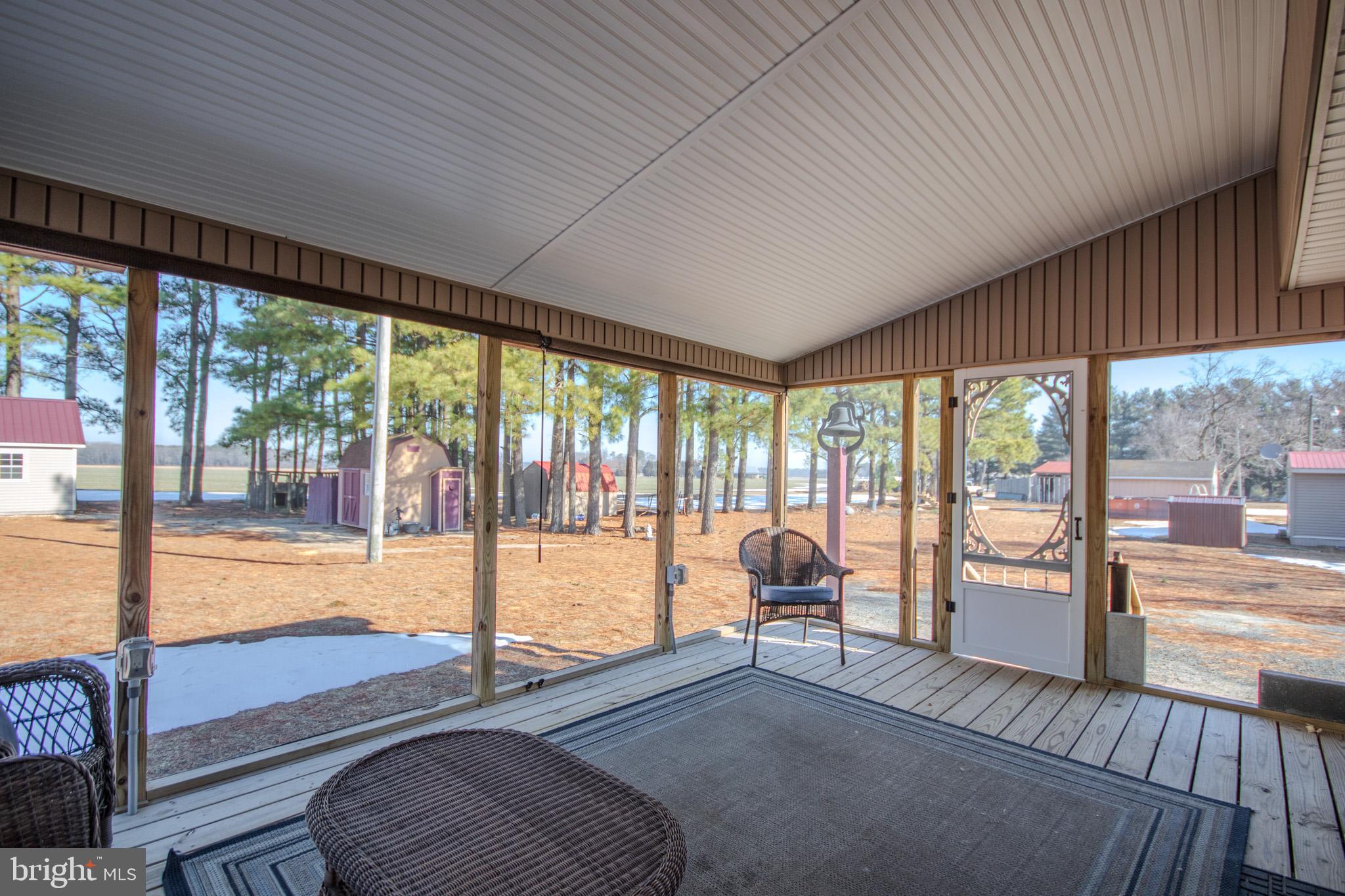 6761 Sharptown Road Laurel, DE 19956 - Photo 26 of 34 a living room filled with furniture and a large window