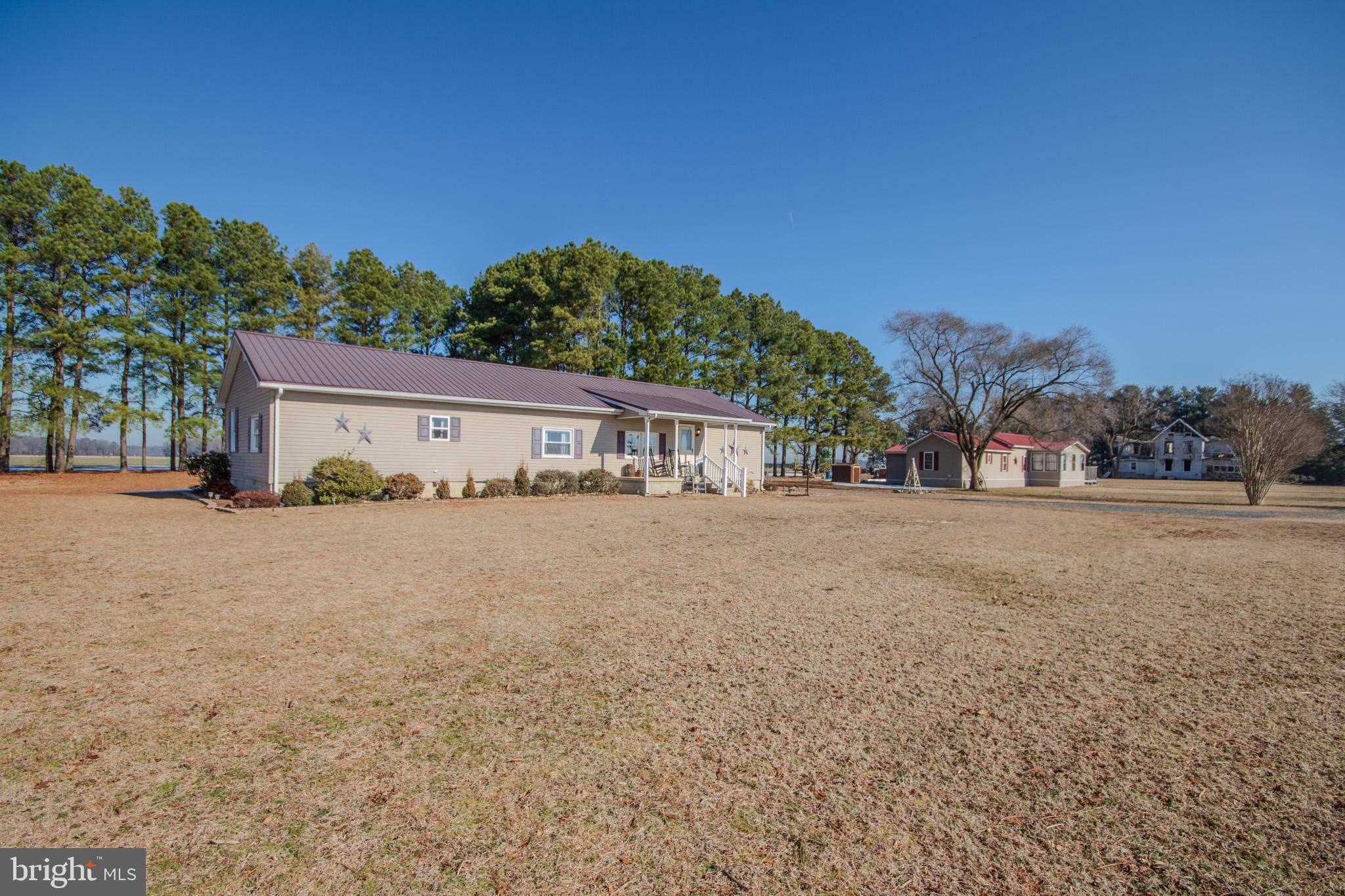 6761 Sharptown Road Laurel, DE 19956 - Photo 3 of 34 a view of house with outdoor space and street view