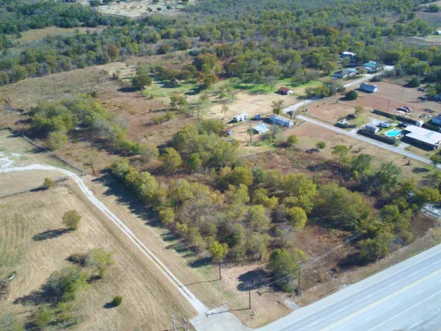 a view of a wooden floor with a yard