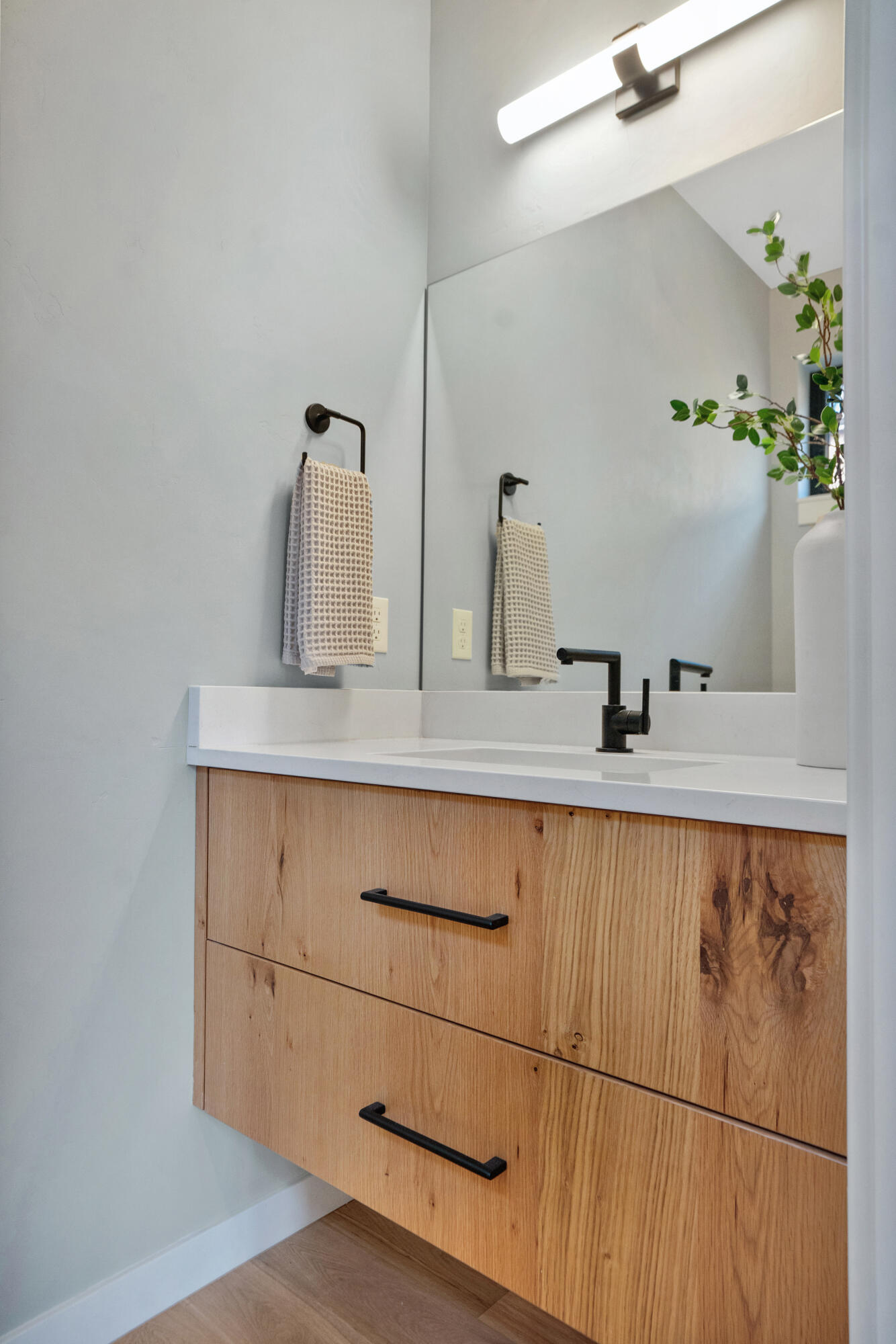 61250 Meeks Trail Bend, OR 97702 - Photo 21 of 43 a bathroom with a sink and mirror