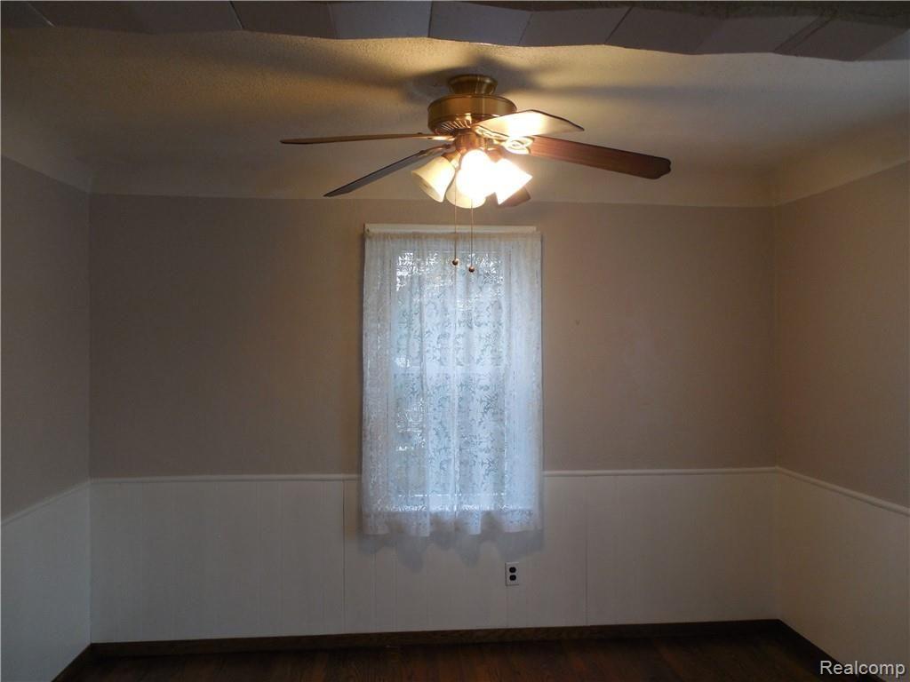 6929 Inkster Road Garden City, MI 48135 - Photo 7 of 65 Dining Room with Wainscoting and chair molding