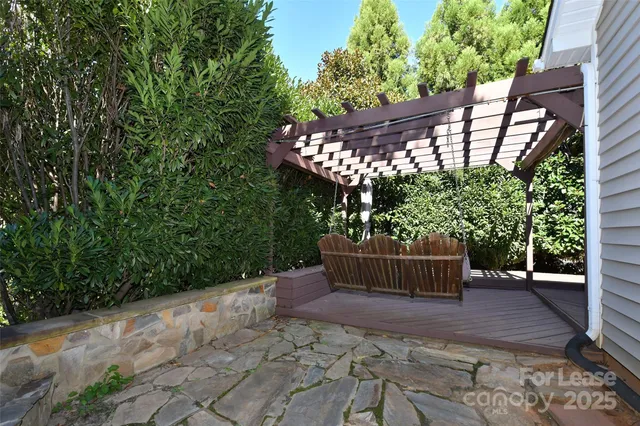 a backyard of a house with lots of green space