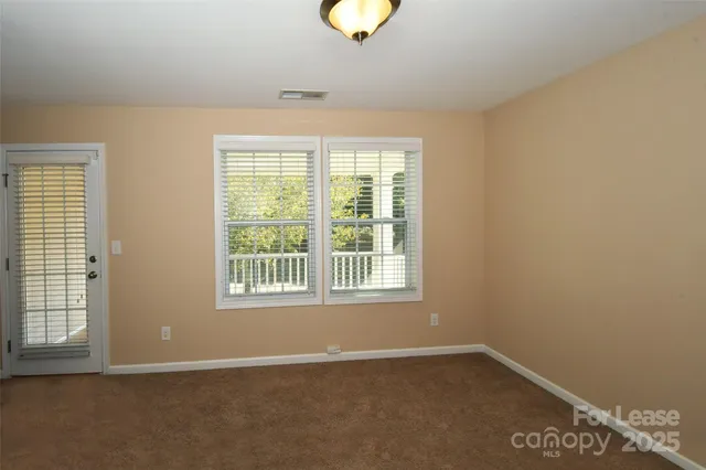 an empty room with window