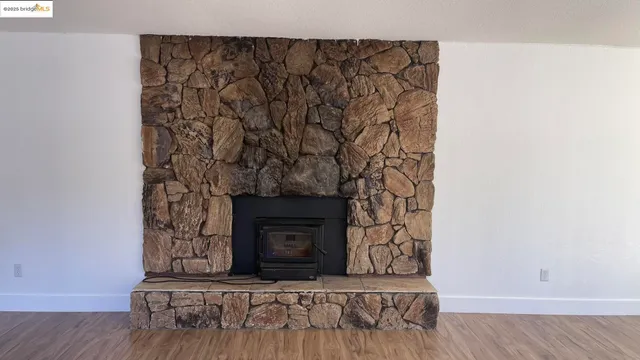 a living room with a fireplace